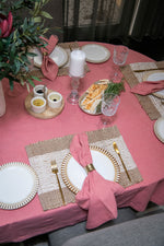 Rose Twilight pink cotton rectangular tablecloth featuring a soft rose pink colour and decorative spoke-stitched edging.