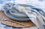 Blue Meadow eucalyptus cotton napkins set of four featuring green botanical foliage on an ivory background.