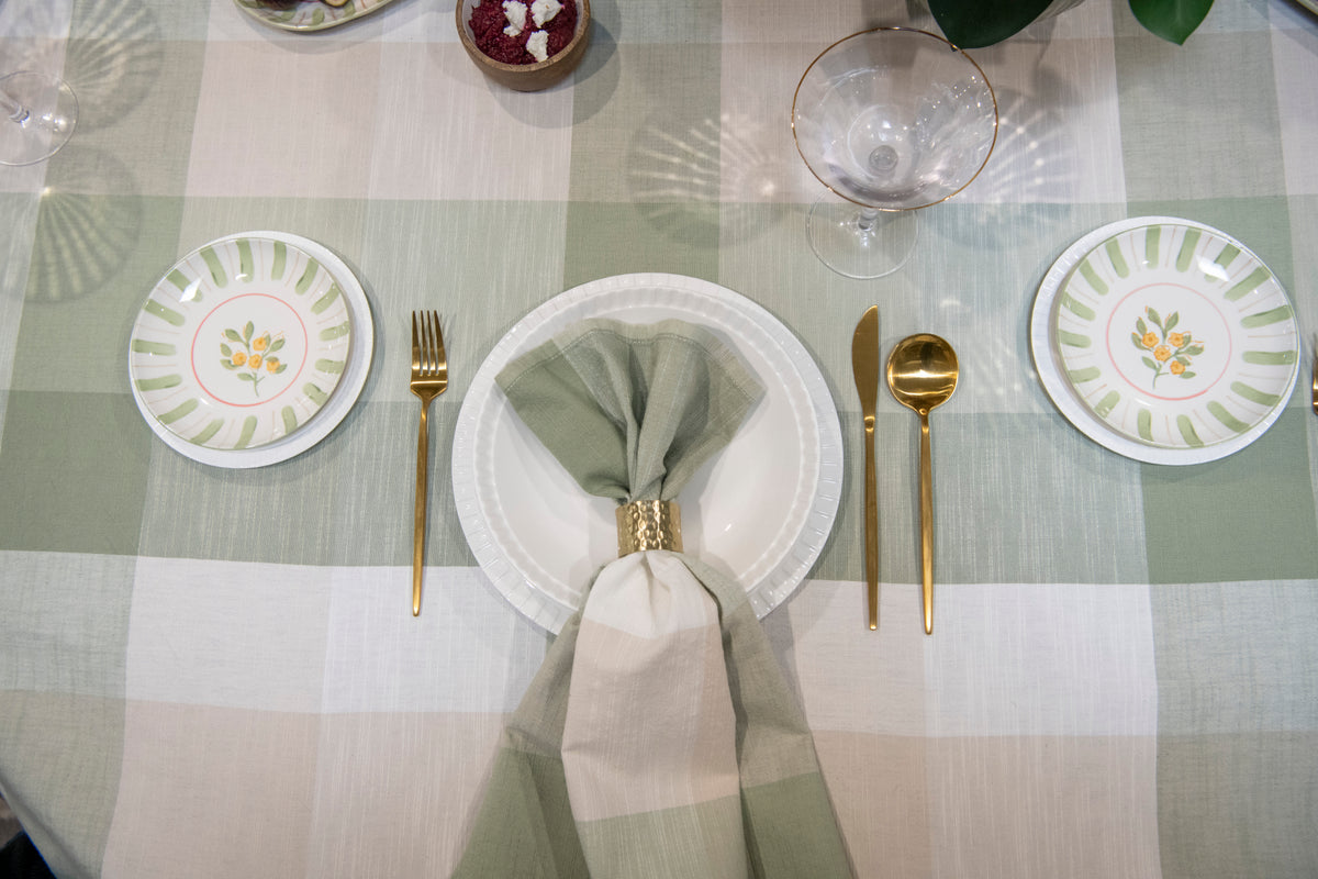 Petal Grove small round stoneware plate featuring pink and green floral detailing with a decorative striped border.
