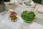 Petal Grove pink and green oval stoneware serving platter featuring a floral design and decorative striped border.