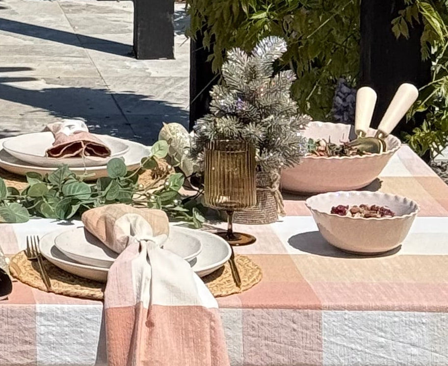 Set of two Marlow blush pink ceramic bowls in complementary sizes, featuring organic wavy rims and a soft speckled glaze.